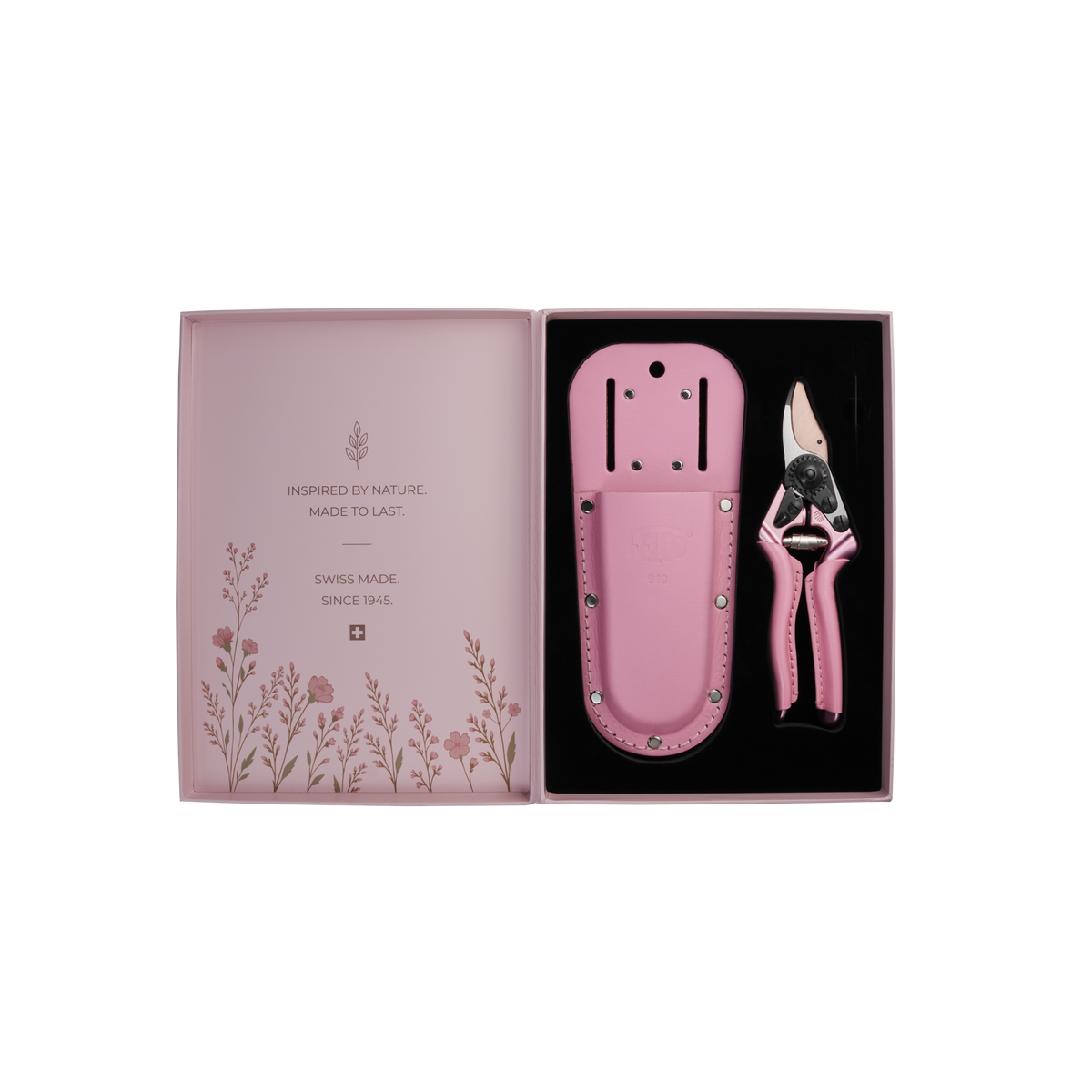 The Pink Blossom collector set laid out with its pruning shear, matching leather holster and presentation box.
